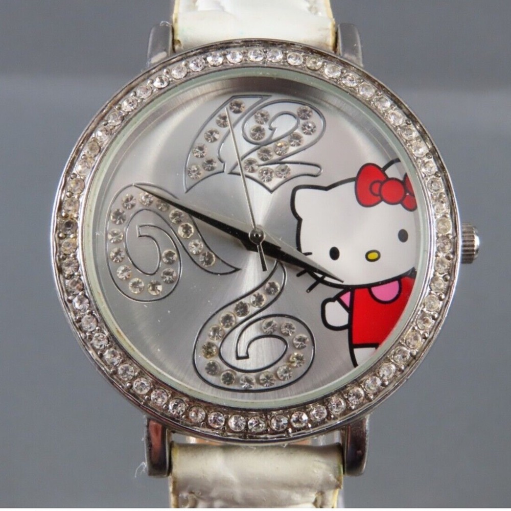 HELLO KITTY Sanrio Wrist Watch CRYSTAL BEZEL & NUMBERS White Leather Band SILVER